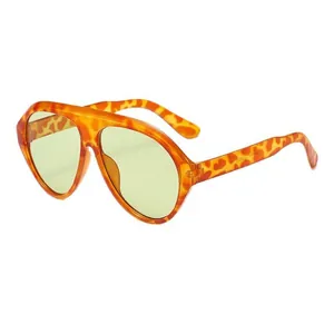 Trendy oversized cyberpunk Y2K sunglasses with tortoise frame and yellow lenses