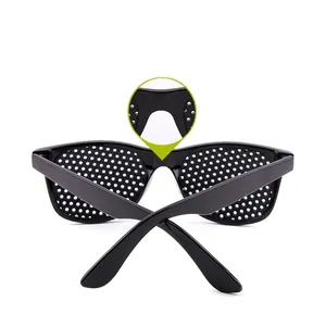 Black classic stenopeic pinhole glasses with vision correction mesh lenses and detail view