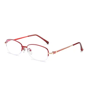 Occhiali da lettura anti-luce blu da donna alla moda, montatura a giorno rosso e oro