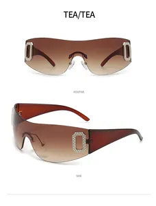 Lunettes de soleil Y2K sans monture avec verres dégradés thé et détails de charnières en strass