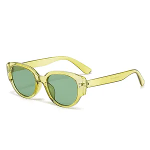 Modische, durchsichtige gelbe Cat-Eye-Sonnenbrille für Damen mit grünen Gläsern