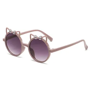 Cute pink cat ear sunglasses for kids with bow accents and purple gradient lenses