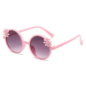 Cute pink children's sunglasses with white sunflower decorations and UV protection