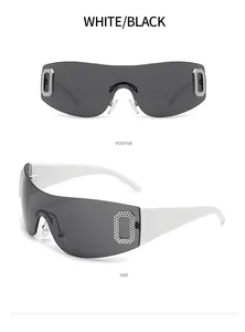 Vue détaillée des lunettes de soleil 2024 Y2K sans monture en blanc et noir chic.