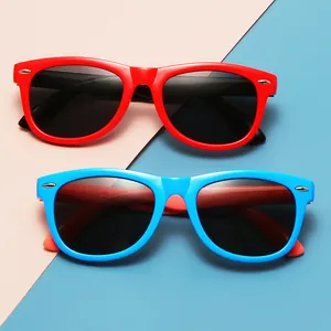 Polarized children's sunglasses in red and blue silicone frames offering full UV protection