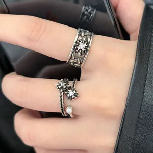 Vintage oxidized Thai silver floral open ring with sparkling crystal and pearl details