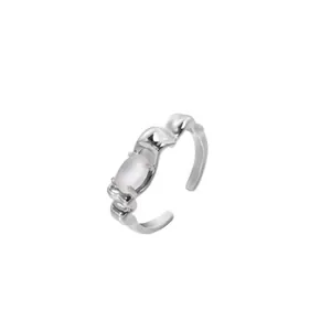 Close-up of moonstone inlaid adjustable open ring with irregular wrinkled silver band