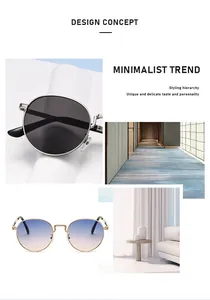 Detailopname van stijlvolle ronde metalen zonnebrillen met een minimalistisch design