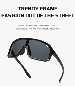 Detailed macro view of professional oversized cycling sunglasses featuring gradient lenses