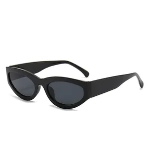 Vintage cat-eye sunglasses featuring a thick black PC frame and dark protective lenses