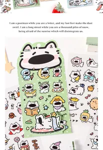 Dettaglio di adesivi in PET impermeabili a tema cane per scrapbooking e diari creativi