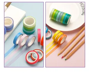 Detailed view of colorful solid color rainbow washi tape rolls for journal decoration
