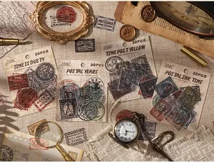 Collection of vintage postmark sticker packs displayed on retro parchment background.