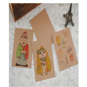 Close-up of artistic hand-drawn illustrations on thick kraft paper cards for DIY crafts