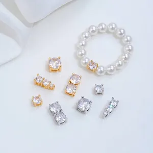Detailed view of 14K gold plated zircon spacer beads and jewelry clasps for DIY