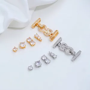 Detailed view of 14K gold plated cubic zirconia 8-shaped clasps and spacer beads.