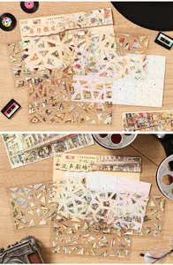 Macro view of vintage 3D miniature scene stickers with retro camera and record props