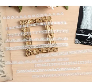 Gedetailleerd overzicht van witte kanten PET-stickers voor DIY-scrapbooking en dagboeken