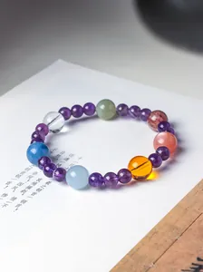 Exquisite detail of a multi-color natural amethyst bracelet with assorted gemstone beads
