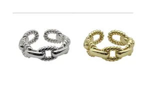 Detailed view of S925 sterling silver chain rings with pig nose link design in gold and silver