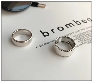 Detailed macro view of 925 sterling silver minimalist and vintage beaded open rings
