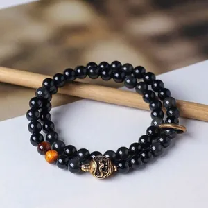 Tibetan style double strand obsidian beaded bracelet with tiger eye and bronze bead