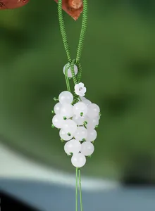 Elegant white chalcedony grape cluster pendant charm with green braided rope for bags