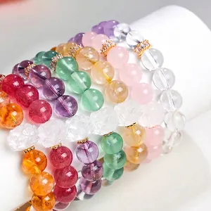 Bracelets perlés en quartz rutilé doré et améthyste avec breloques de lotus en cristal