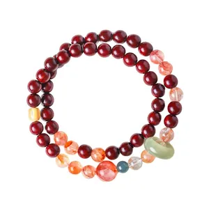 Dubbele bloedsandelhouten armband met Hetian jade ring en rode kwarts kralen