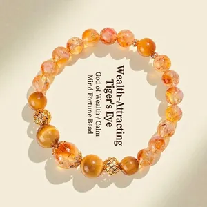 Elegant yellow crystal and golden tiger eye beaded bracelet for women with ornate spacers