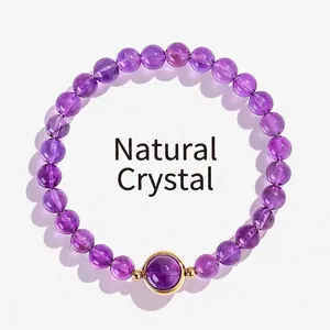 Elegant lavendel amethist kristallen kralenarmband met een gouden accentkraal