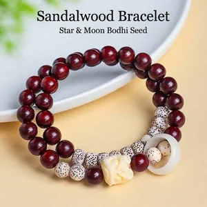 Dubbele natuurlijke sandelhout kralenarmband met Xingyue Bodhi zaden en leeuw charm