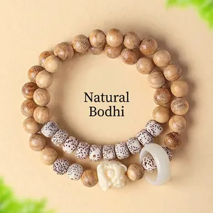 Natuurlijk groen sandelhouten dubbele armband met Bodhi-zaden en leeuwenbedeltje.