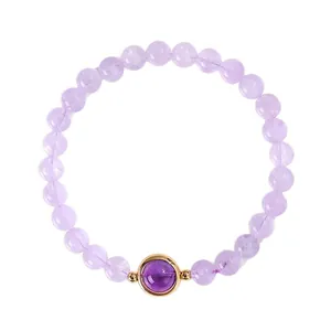 Elegante armband met lavendel amethist kralen en een goudkleurige paarse kristallen hanger