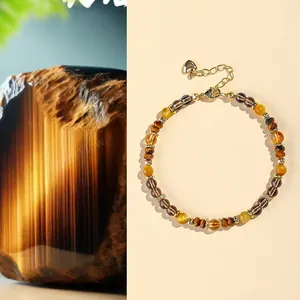 Armband aus natürlichem Tigerauge und gelbem Kristall mit verstellbarer Goldkette