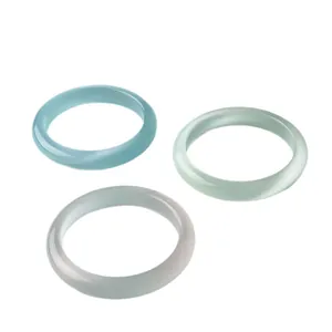 Elegante kattenoogsteen armbanden voor dames in lichtblauw groen en wit maansteen effect