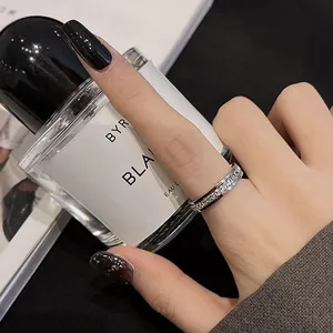 Elegantly designed full diamond titanium steel eternity ring for women shown on finger
