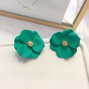Elegant teal green matte flower stud earrings with textured gold centers for women