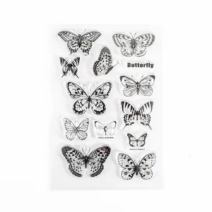 Detailed view of clear silicone butterfly stamps for scrapbooking and DIY crafts