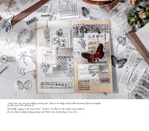 Close-up detail of retro clear silicone stamps with botanical and butterfly motifs.