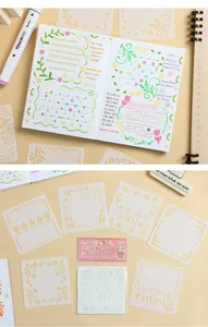 Close-up of cute PET floral and border stencils for DIY journaling and drawing decoration