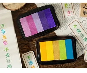 Detailed top-down shot of two colorful 5-color gradient ink pads for DIY stamp crafts