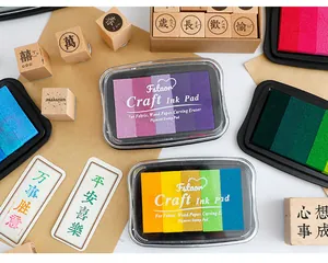 Detailed view of colorful 5-color gradient ink pads with wooden stamps for DIY