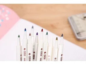 Detailed close-up of STA metallic paint markers with vibrant multi-color tips for DIY art