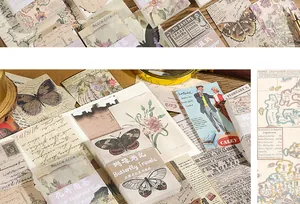 Detailweergave van vintage scrapbook papier set met vlinder- en bloementhema's voor hobby