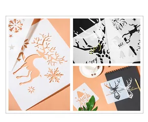Close-up detail of Christmas drawing stencils with reindeer and snowflake patterns.