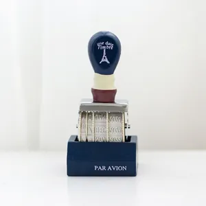 Timbro datario a rullo blu vintage con design Torre Eiffel e base in legno pregiato