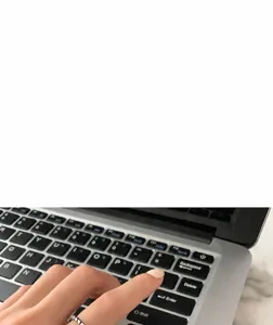 Detailed view of a vintage silver braided ring worn on a finger in a lifestyle setting.