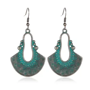 Orecchini vintage in stile bohémien con dettagli in bronzo e finiture verde acqua