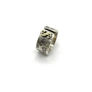 Detailed view of retro 925 sterling silver open ring with a gold dollar sign symbol